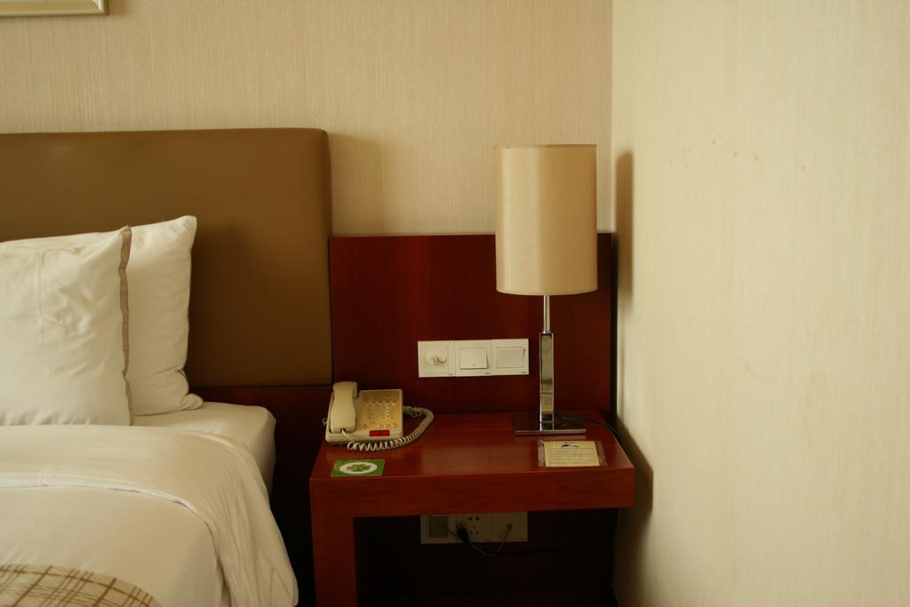 Merryland Traders Hotel Changshu Camera foto