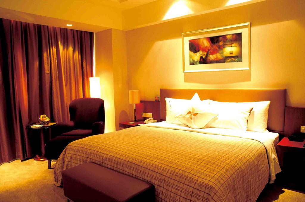 Merryland Traders Hotel Changshu Camera foto