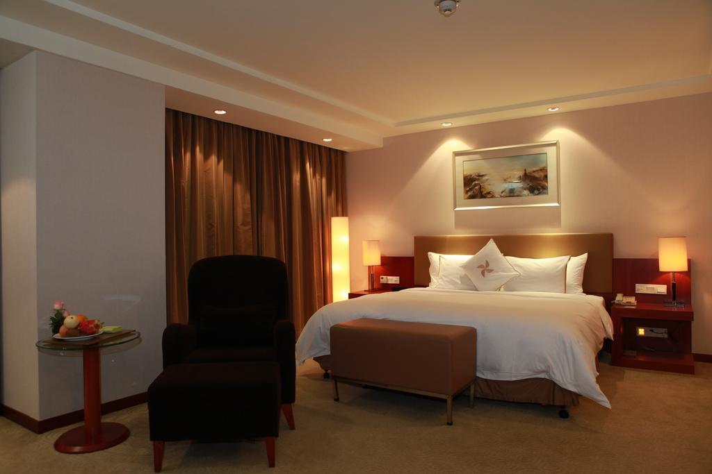 Merryland Traders Hotel Changshu Camera foto