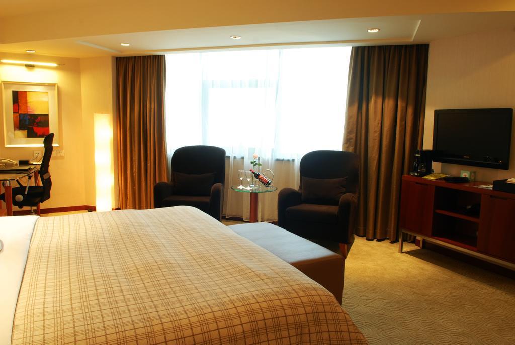 Merryland Traders Hotel Changshu Camera foto